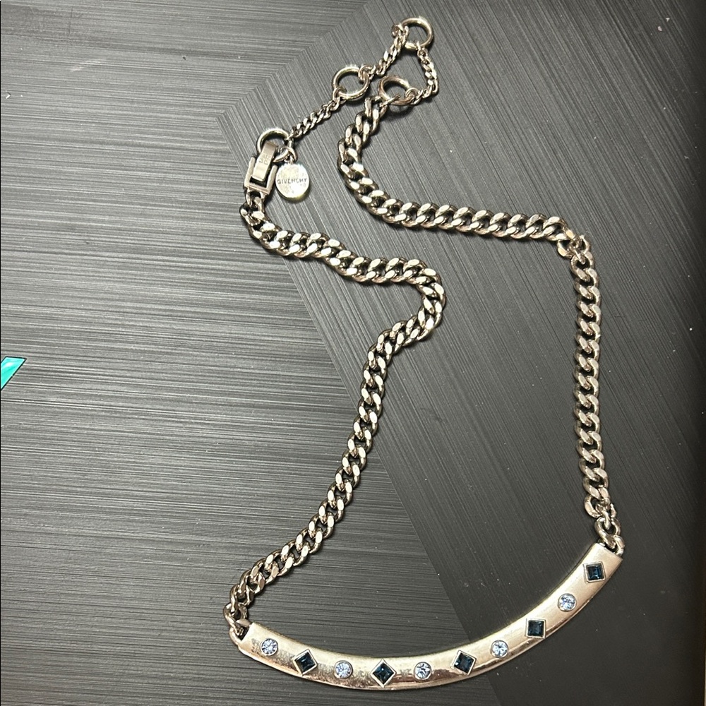 Charming Gold Necklace with Black and Silver Accents. By Gavinche